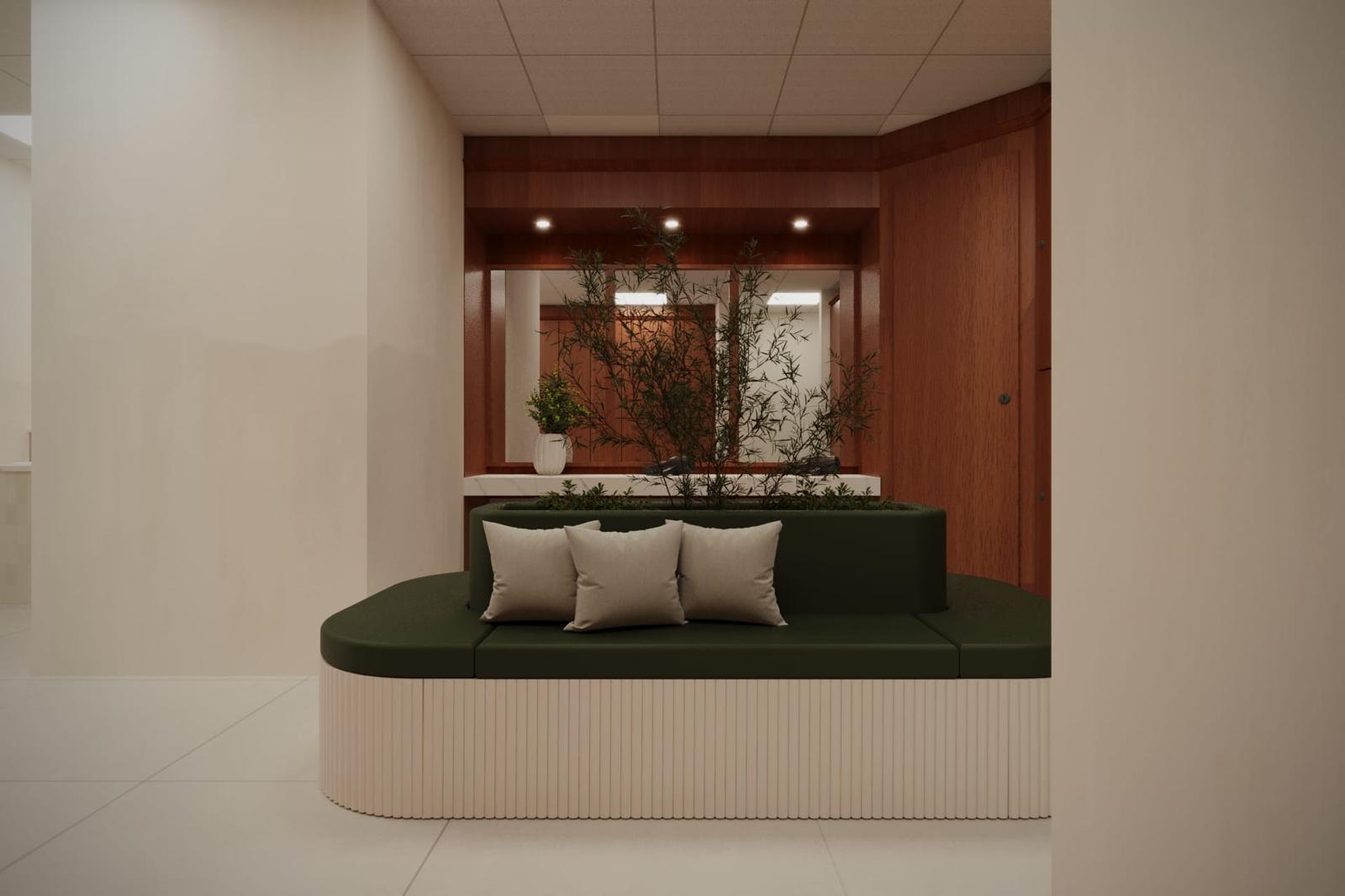 An olive velvet planter bench in the changing lounge