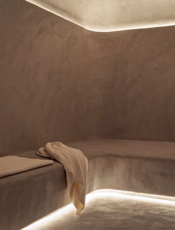 Warm timber and stone inside the thermal suite