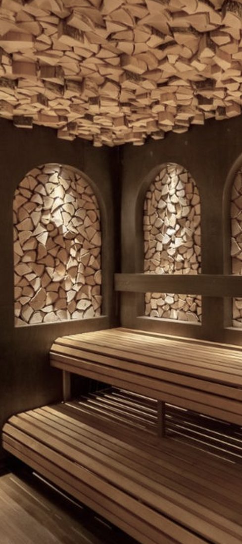 The steam room finished in smooth stone